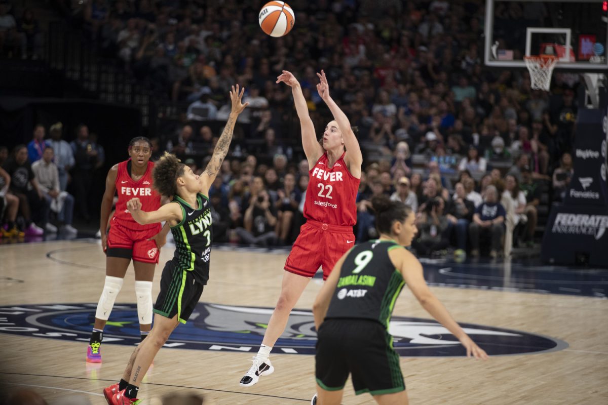 Indiana guard Caitlin Clark takes a shot during a WNBA game between the Minnesota Lynx and the Indiana Fever at the Target Center in Minneapolis on Aug. 24. The Lynx defeated the Fever, 90-80.
